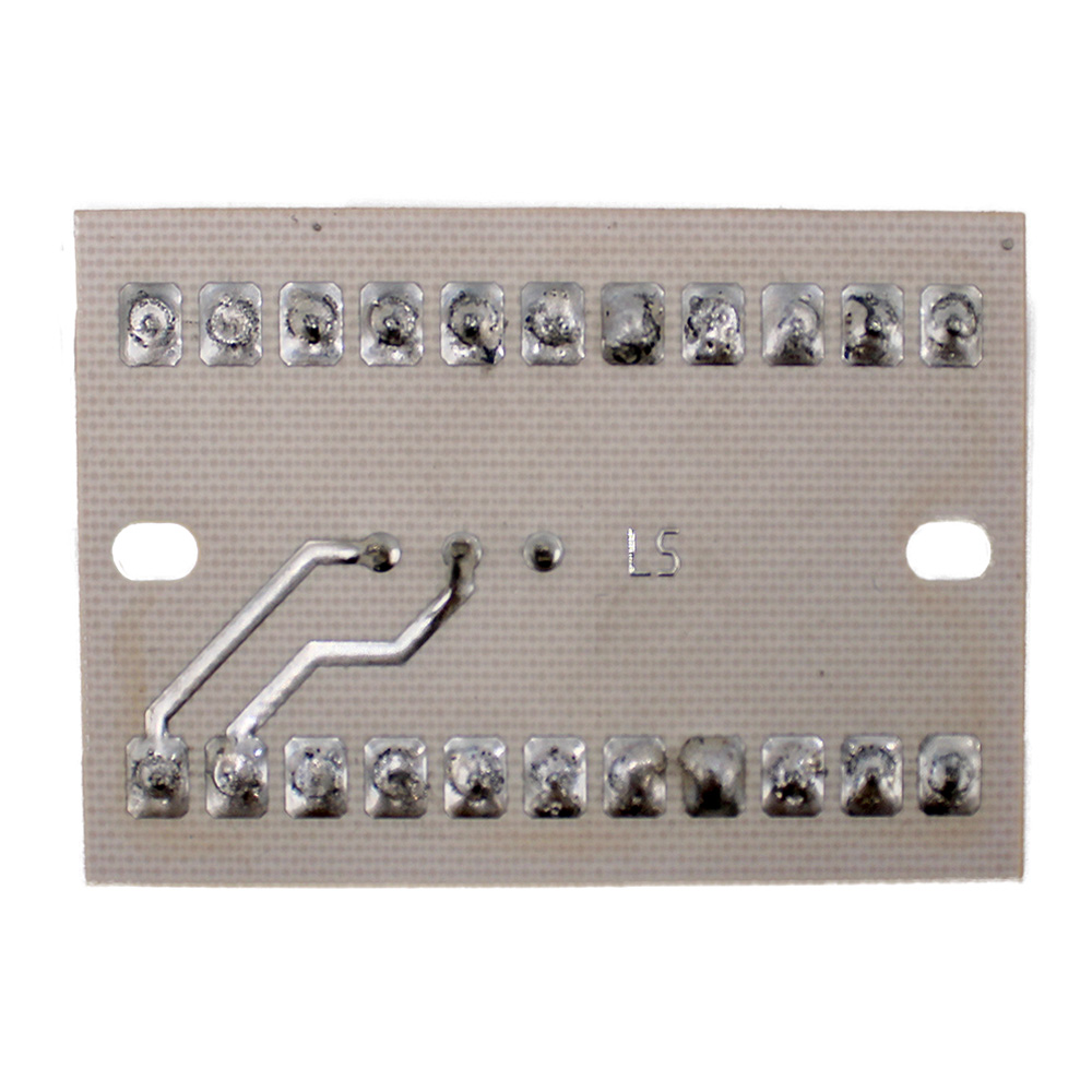 Rückansicht der Aritech Verteilerplatine PLSV10DAD mit Lötpunkten und Leiterbahnen